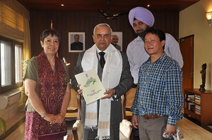 The Governor of Arunachal Pradesh Lt. Gen (Retd) Nirbhay Sharma with the recommendations of the 2nd State Finance Commission at Raj Bhawan, Itanagar on 30th June 2014. Also seen: The Chairperson of State Finance Commission Smt Fantry Mein Jaswal, IRS (Retd) Secretary to Governor Shri Shurbir Singh, Secretary, State Finance Commission Shri Dani Salu